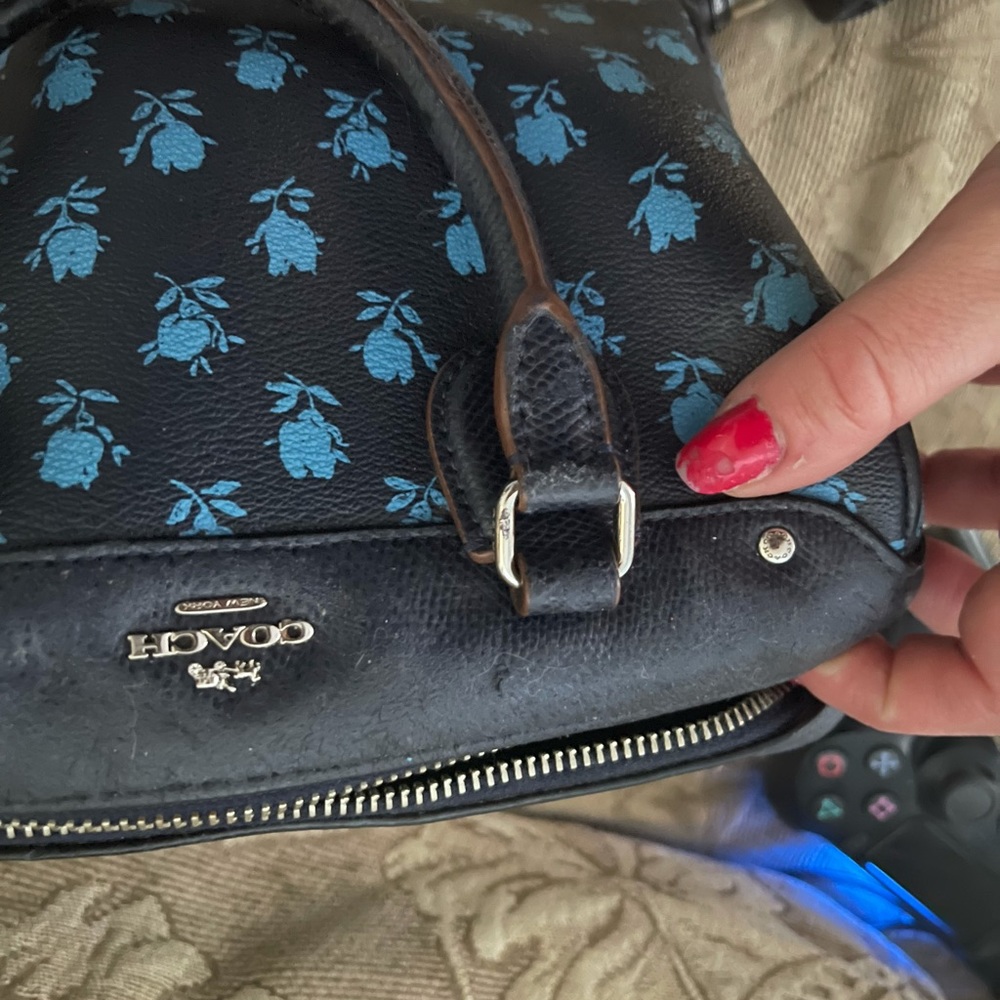 Small coach bag very cute minimal damage